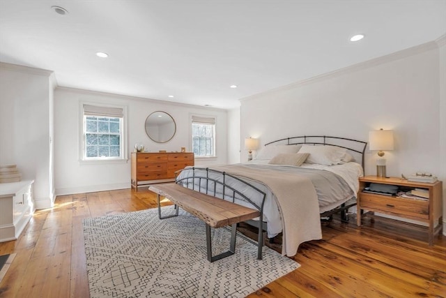 bedroom featuring recessed lighting, baseboards, light wood-style floors, and ornamental molding