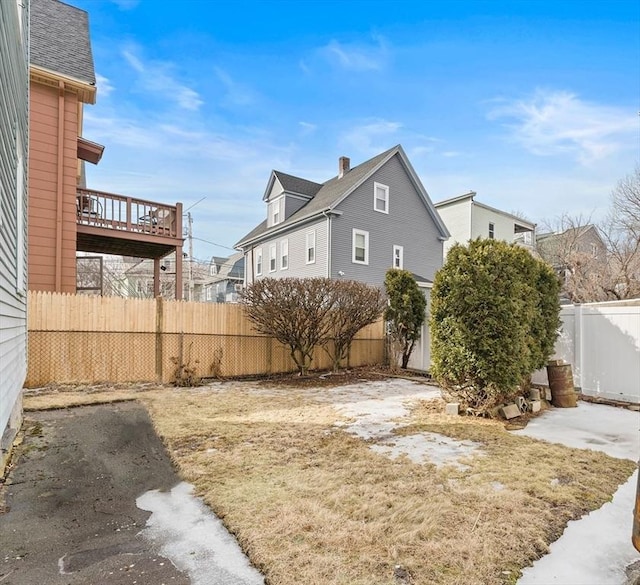 view of yard with a fenced backyard