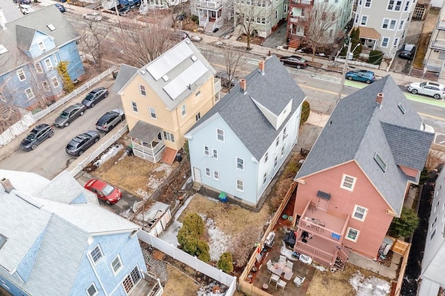 birds eye view of property with a residential view