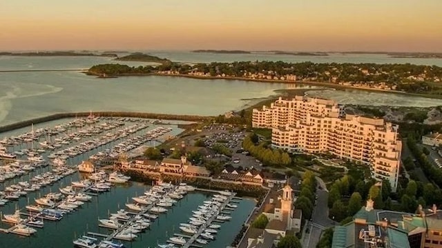 aerial view at dusk with a water view