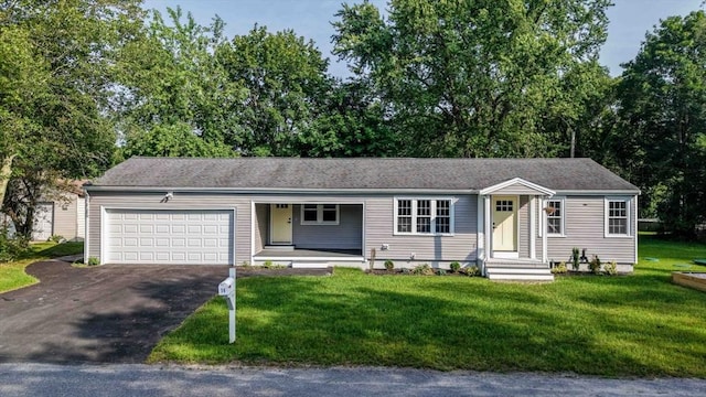 11 Rose Ave, Westport, MA 02790 - ranch-style home with asphalt driveway, a garage, and a front yard