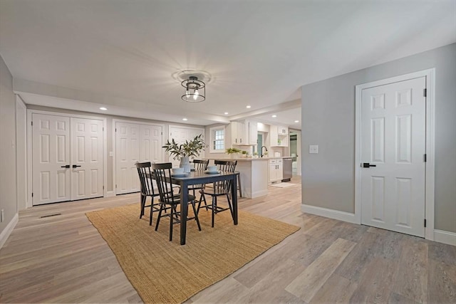 11 Rose Ave, Westport, MA 02790 - dining space featuring light wood-style floors and recessed lighting