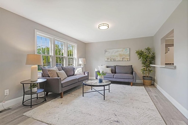 11 Rose Ave, Westport, MA 02790 - living area with wood finished floors and baseboards