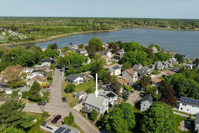 view of property location featuring nearby suburban area and a large body of water