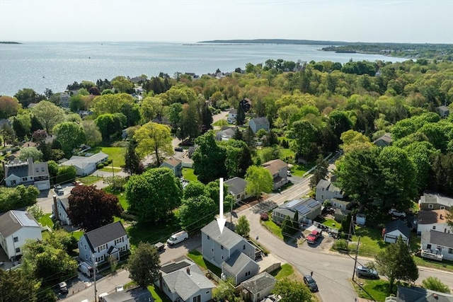aerial perspective of suburban area featuring a large body of water