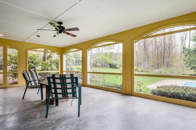 sunroom with finished concrete flooring