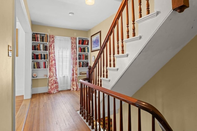 31 Boylston St, Boston, MA 02130 - foyer entrance with wood-type flooring, baseboards, and stairs