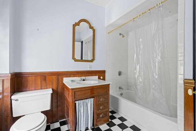 31 Boylston St, Boston, MA 02130 - full bathroom featuring tile patterned floors, toilet, vanity, shower / bath combo with shower curtain, and wainscoting