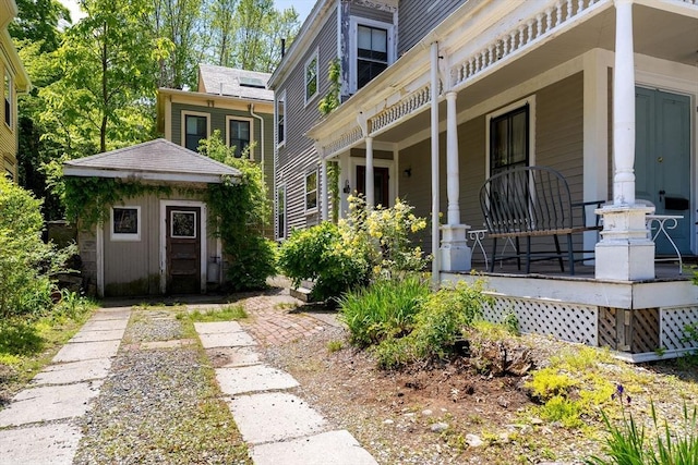 31 Boylston St, Boston, MA 02130 - view of property exterior with covered porch and an outbuilding
