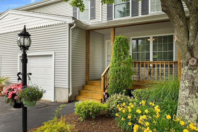 48 Finch Rd Unit 2, Raynham, MA 02767 - entrance to property featuring a porch and a garage