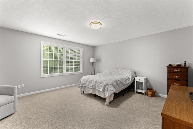 48 Finch Rd Unit 2, Raynham, MA 02767 - bedroom featuring carpet flooring and a textured ceiling