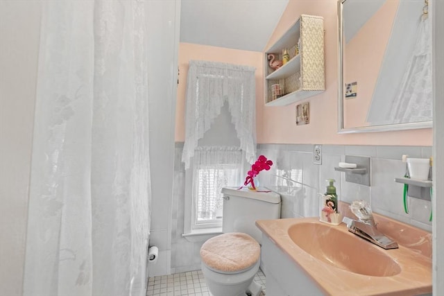 8A 3rd St, Medford, MA 02155 - full bath featuring tile walls, vanity, vaulted ceiling, tile patterned flooring, and a shower with shower curtain
