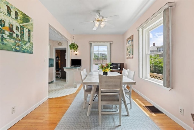8A 3rd St, Medford, MA 02155 - dining space featuring ceiling fan and light wood-type flooring
