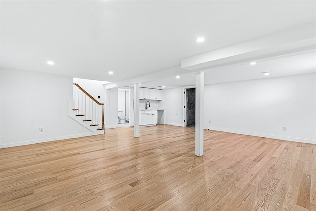 basement with light wood-type flooring