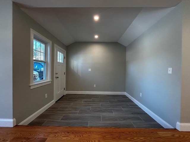 foyer entrance with lofted ceiling