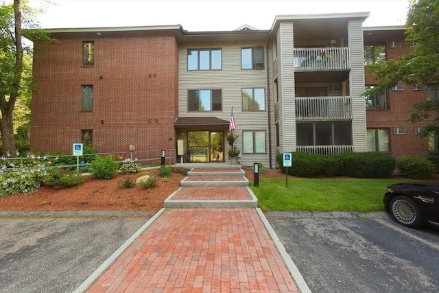 300 Candlewood Park Unit 32, Nashua, NH 03062 - view of property with uncovered parking