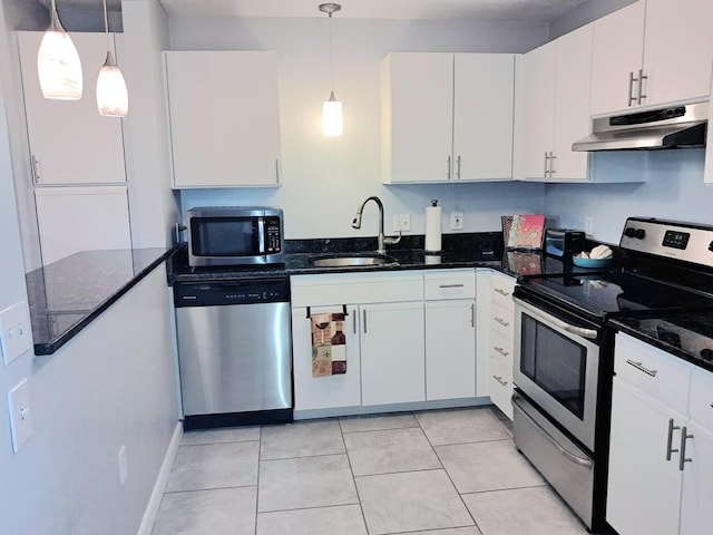 300 Candlewood Park Unit 32, Nashua, NH 03062 - kitchen featuring stainless steel appliances, a sink, under cabinet range hood, and white cabinets