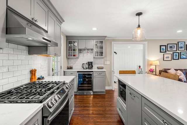 11 Bruce Ln, Wenham, MA 01984 - kitchen featuring wine cooler, appliances with stainless steel finishes, gray cabinetry, under cabinet range hood, and ornamental molding