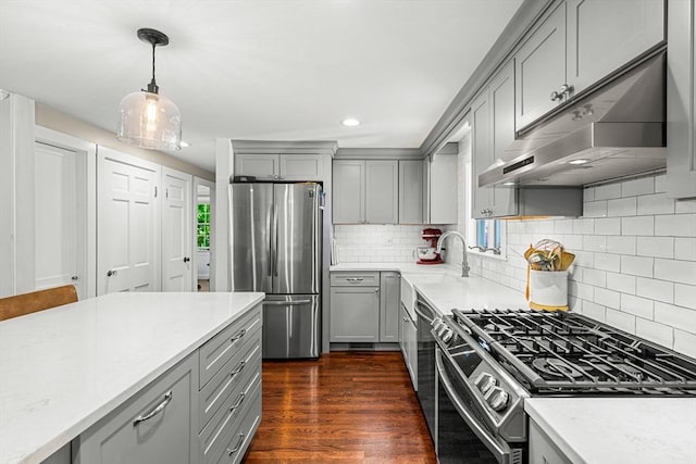 11 Bruce Ln, Wenham, MA 01984 - kitchen with appliances with stainless steel finishes, gray cabinets, under cabinet range hood, light countertops, and recessed lighting