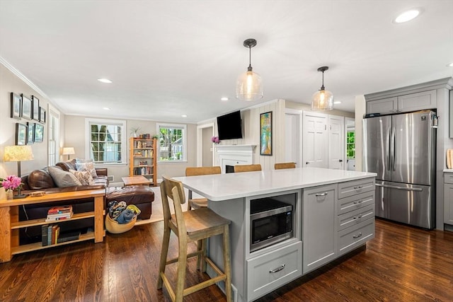 11 Bruce Ln, Wenham, MA 01984 - kitchen featuring stainless steel appliances, gray cabinets, open floor plan, light countertops, and recessed lighting
