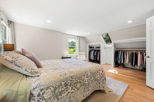 11 Bruce Ln, Wenham, MA 01984 - bedroom with multiple closets, light wood finished floors, recessed lighting, and lofted ceiling