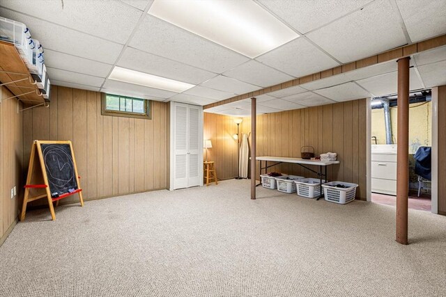 11 Bruce Ln, Wenham, MA 01984 - basement with washer / clothes dryer, carpet flooring, a drop ceiling, and wooden walls
