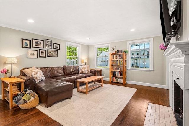 11 Bruce Ln, Wenham, MA 01984 - living area with a fireplace with flush hearth, ornamental molding, baseboards, dark wood-style flooring, and recessed lighting