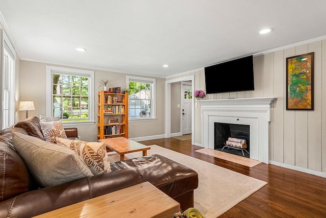 11 Bruce Ln, Wenham, MA 01984 - living room featuring crown molding, baseboards, wood finished floors, a brick fireplace, and recessed lighting
