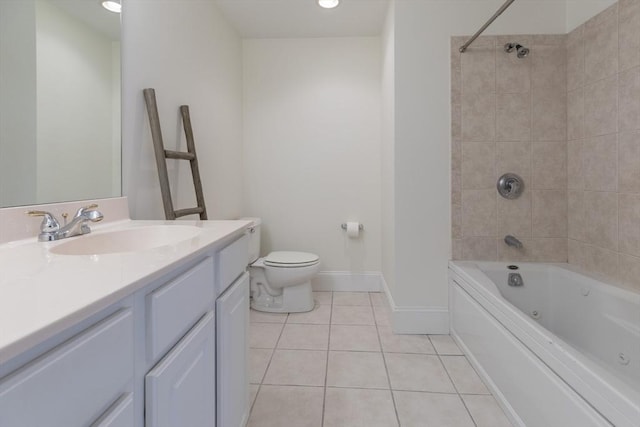 bathroom with a combined bath / shower with jetted tub, baseboards, toilet, tile patterned floors, and vanity