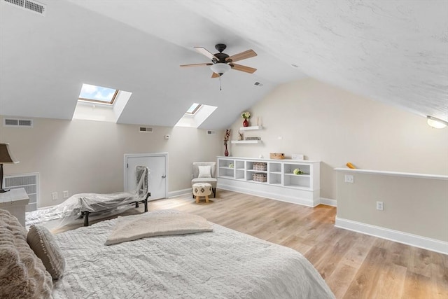 10 Sprucewood Ln Unit 10, Worcester, MA 01606 - bedroom featuring a skylight, wood finished floors, vaulted ceiling, and ceiling fan