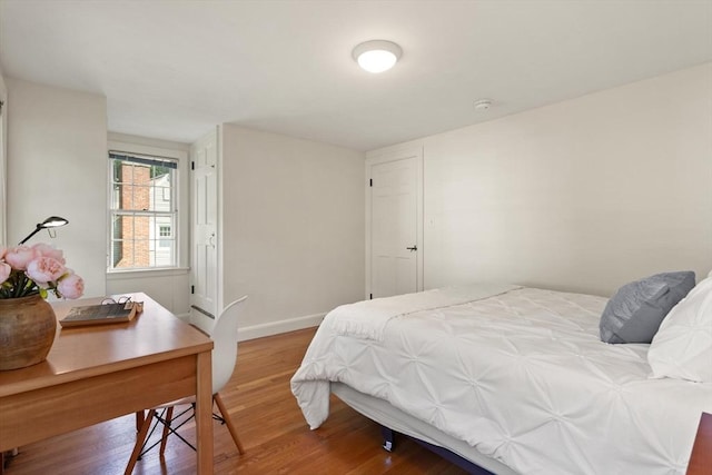 94 Laurel Dr, Needham, MA 02492 - bedroom with wood finished floors and baseboards