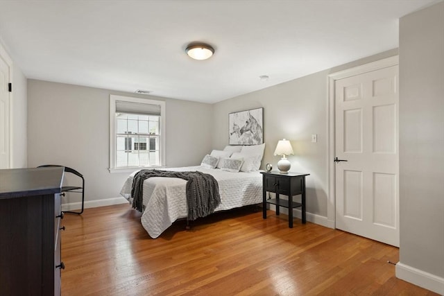 94 Laurel Dr, Needham, MA 02492 - bedroom with light wood-type flooring and baseboards