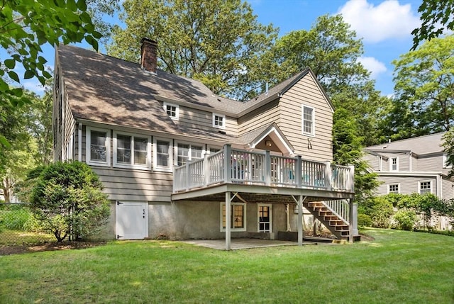 94 Laurel Dr, Needham, MA 02492 - back of property featuring a deck, a chimney, a patio, and stairway