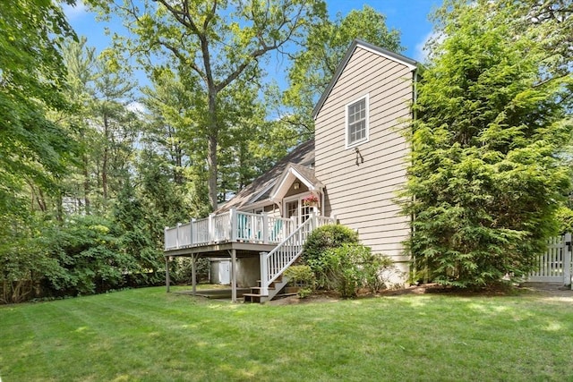 94 Laurel Dr, Needham, MA 02492 - view of green lawn with stairs and a wooden deck