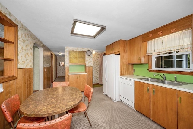 101 Harold Ave, Dracut, MA 01826 - kitchen with white appliances, wallpapered walls, light countertops, light carpet, and open shelves