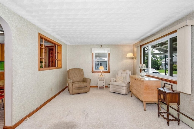 101 Harold Ave, Dracut, MA 01826 - living area with arched walkways and carpet