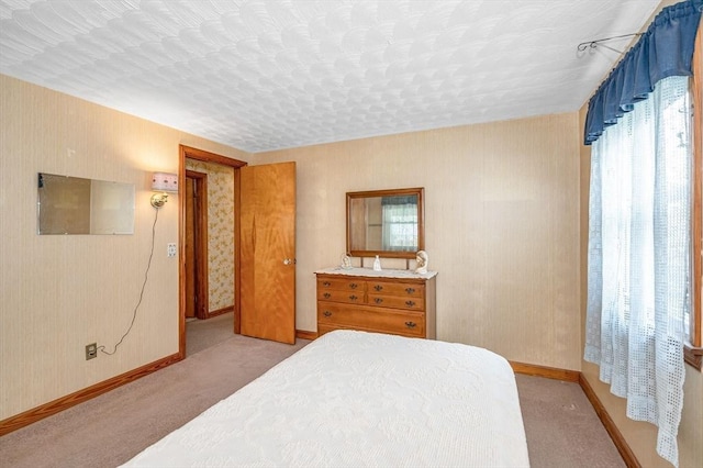 101 Harold Ave, Dracut, MA 01826 - bedroom with multiple windows and light colored carpet