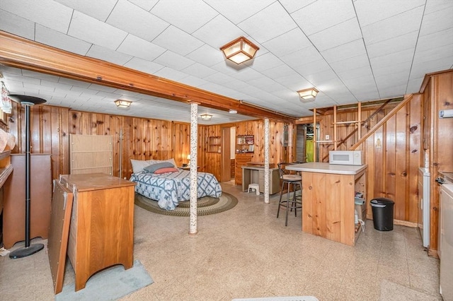 101 Harold Ave, Dracut, MA 01826 - bedroom with wood walls and light flooring