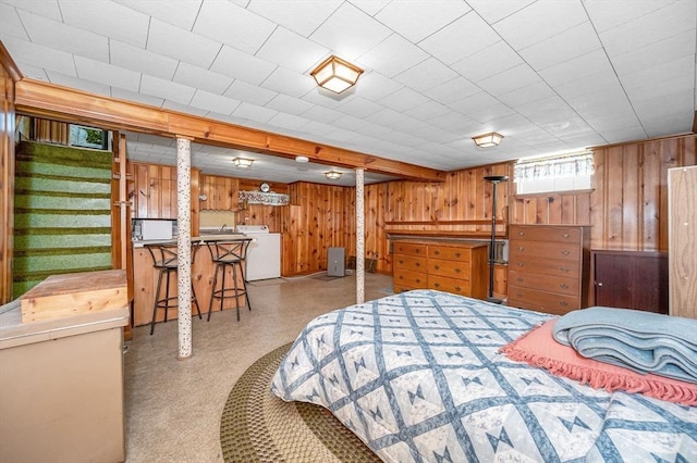 101 Harold Ave, Dracut, MA 01826 - bedroom with washer / clothes dryer and wood walls