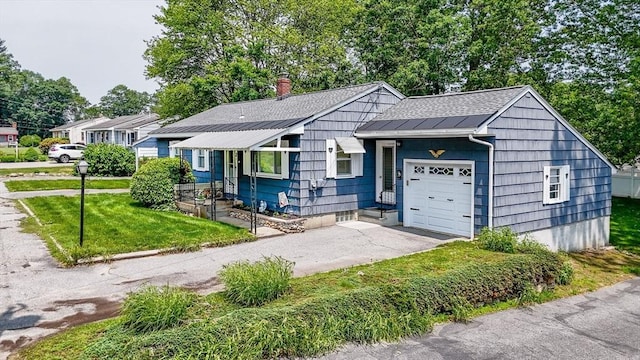101 Harold Ave, Dracut, MA 01826 - single story home featuring an attached garage, driveway, a front lawn, a metal roof, and a standing seam roof