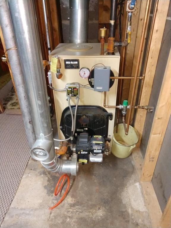 101 Harold Ave, Dracut, MA 01826 - utility room featuring a heating unit