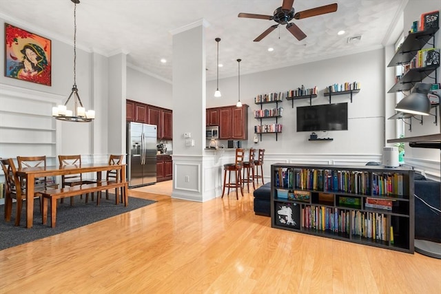 215 Harvard St Unit 40, Medford, MA 02155 - living area featuring ceiling fan, crown molding, light wood finished floors, a chandelier, and recessed lighting