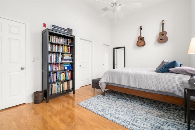 215 Harvard St Unit 40, Medford, MA 02155 - bedroom with light wood-style flooring and a ceiling fan