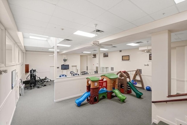 215 Harvard St Unit 40, Medford, MA 02155 - rec room featuring ceiling fan, a paneled ceiling, carpet flooring, and baseboards