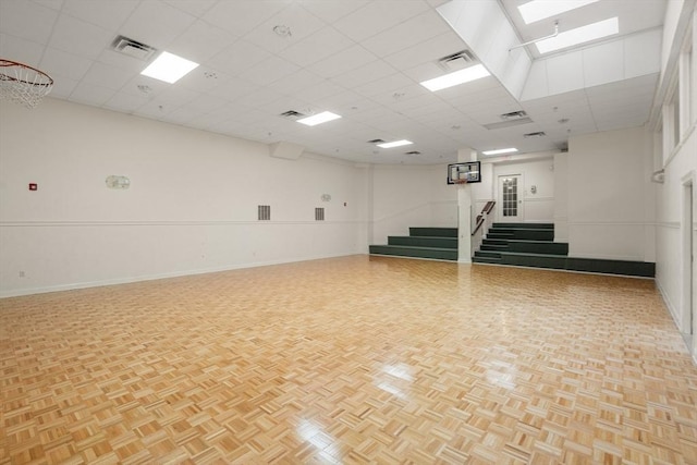 215 Harvard St Unit 40, Medford, MA 02155 - unfurnished room featuring baseboards, a drop ceiling, a skylight, and stairway