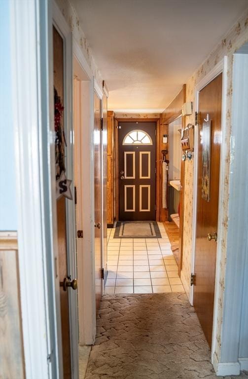 89 Audubon Ave, Braintree, MA 02184 - corridor featuring light tile patterned floors and light colored carpet