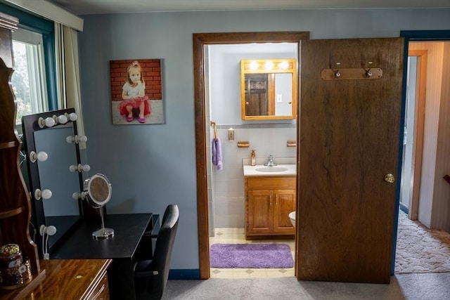 89 Audubon Ave, Braintree, MA 02184 - bathroom featuring vanity and tile walls
