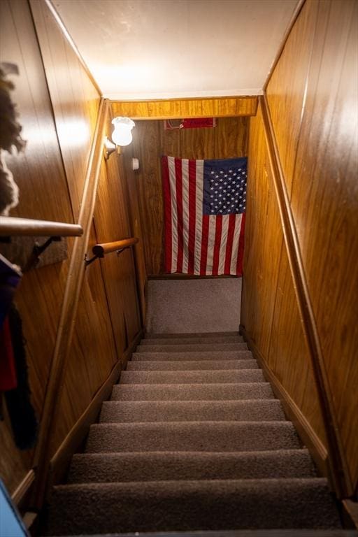 89 Audubon Ave, Braintree, MA 02184 - staircase featuring wooden walls and carpet
