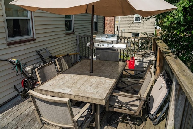 89 Audubon Ave, Braintree, MA 02184 - wooden deck featuring outdoor dining space and grilling area