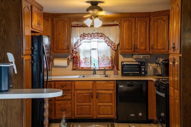 89 Audubon Ave, Braintree, MA 02184 - kitchen with black appliances, light countertops, a ceiling fan, and brown cabinetry